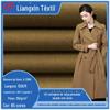 Sarja penteada 40 com lavagem à areia 190g algodão lavado oblíquo Casaco trench coat feminino calça casual Tecido Parker