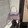 Bolsa de Mão Kelly para Comutação no Comércio Exterior 2026 Nova Tendência Fashionável Padrão Crocodilo Grande Capacidade Ombro Único Transversal Pequena Quadrada