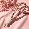 Correas de muñeca tejidas a mano de colores para teléfono de comercio exterior, disponibles en varios colores, llaveros, colgantes para bolsos y botellas de agua, venta al por mayor desde el fabricante