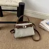 Bolsa de nicho estilo francês para mulheres, nova moda outono e inverno de 2026, bolsa de ombro simples, bolsa transversal casual para o dia a dia