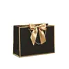 Empaque Lazo de Regalo Personalizado Bolsa de Papel de Mano Bolsa de Compras Lista para Usar Exportación Transfronteriza Impresión de Logotipo Fabricante Envío Gratis