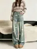 Pantalones vaqueros bordados de estilo coreano para mujer, con corte recto, cintura alta y efecto adelgazante, diseñados para otoño e invierno 2026, con una caída elegante y silueta de pierna ancha.