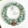 Pulsera de Raíz de Bodhi Estilo Paisaje con Cuentas Verdes Estilo Antiguo y Patrones Florales, una Pulsera de Cuentas Budistas para Sostener en la Mano para Mujeres en Estilo Chino Tradicional