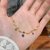 Moda Retro Francesa Exquisita Versátil Estilo Palacio Cadena para Clavícula de Lujo Ligero de Gama Alta con Borla de Gota de Agua Cepillada para Mujeres