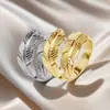 Anillo de Acero de Titanio Transfronterizo Europeo y Americano Moda Acero Inoxidable Apertura Ajustable Anillo de Dedo Geometría de Presión de Aceite Anillo de Viento Versátil para Mujeres