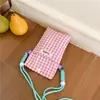 Nueva bolsa de teléfono a cuadros versátil de verano, bolso cruzado pequeño casual de moda para llaves, bolsa de almacenamiento simple de tela pequeña para mujer