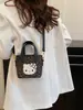 Bolso de cubo retro europeo y americano moderno y personalizado para mujer, estampado de leopardo, a la moda y con estilo, diseño de nicho, adecuado para ir al trabajo, bolso de mano y bolso cruzado