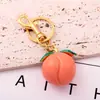 Llavero de Cadena para Coche de Melocotón Blanco Fruta Realista Lindo Exquisito Accesorios de Bolsa de Fruta Colgante Decorativo para Mujer