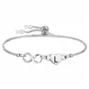Pulseira Infinito Puxável Simples em Forma de Coração Mais Vendida Transfronteiriça com Gravação de Logo de 26 Letras Joia Feminina em Aço Titânio que Não Desbota