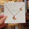 Collar de Acero de Titanio de Moda en Oro Real de 18 Quilates, Colgante Exquisito de Lujo Ligero de Nicho, Cadena Versátil de Alta Gama para Clavícula para Mujeres