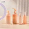 Botellas de set cosmético, botellas dispensadoras de loción, botellas de sérum, botellas con bomba dosificadora de limpieza de 100 ml, botellas de crema de boca ancha degradadas