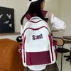 Mochila Modelo Nuevo 2025 para Estudiantes de Secundaria y Universidad, Mochila de Bloques de Color Moda Estilo Coreano, Bolsa de Marca de Moda de Gran Capacidad, Comercio Exterior