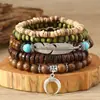 Nuevo Juego de Pulseras Multicapa de Plumas Turquesa Madera Ala de Pollo Múltiples Piezas Retro Colgante de Cuerno Cuentas de Madera Pulsera Multicapa