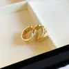 Pendientes de plata de ley S925 con microincrustaciones de circonita dorada para mujer, nicho de lujo ligero, pendientes nuevos únicos y versátiles