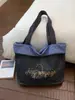 Bolsa de mano casual de nailon estilo coreano, bolso de mano de moda con estampado de letras, popular bolso de hombro de rayas reversible para mujer