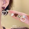 Set de Aretes Sencillos de Moda con Forma de Gota de Aceite Perla Corazón Aguja Plateada Aretes de Botón Retro Francés Aretes de Lujo Ligero de Alta Gama para Mujer