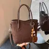 Bolso de mano vintage transfronterizo para mujer, nuevo bolso tipo cubo de moda otoño 2026, bolso de hombro cruzado casual para el trabajo