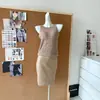 "Dinheiro velho solto" colete de crochê resistente versátil emagrecedor + design de cintura em Tencel senso de design saia média cor sólida