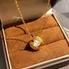 Nueva Moda Lujo Ligero Zirconita Cepillada Incrustada Colgante Diseño Nicho Collar Flotante de Planeta de Gama Alta para Mujer