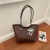 Bolso Tote de Lujo Ligero Bolso Retro de Nicho para el Trabajo Nuevo Estilo Coreano 2026 Bolso de Hombro Grande de Gran Capacidad Simple