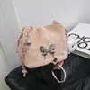 Bolso de cadena pequeño popular para mujer de este año 2024 nuevo diseño de nicho bolso cruzado de mariposa bolso de cubo de hombro con cordón