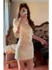 Conjunto de Dos Piezas Estilo Coreano y Japonés para Mujer, Primavera y Otoño 2026: Conjunto de Top de Punto y Falda a la Moda y Elegante