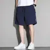 Tendencia de trabajo shorts escolares de seda helada holgados para hombre verano nuevo secado rápido pantalones deportivos finos estudiante casual pantalones de tiro medio hombre