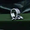 Anillo de plata de ley S925 de nicho multicapa para dedo índice femenino calavera cruz personalidad colgante retro borla moda al por mayor