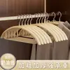 Percha de plástico antideslizante, sin costuras, de hombros anchos y engrosada para uso doméstico, adecuada para dormitorios de estudiantes y colgar en el armario