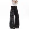 Jeans de mezclilla lavada estilo American high street con remaches y diseño de corte angulado, unisex, pierna recta, elegantes, pantalones largos de pierna ancha para jóvenes