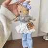 Bolsa Colgante Hello Kitty Piernas Largas Fragancia Ligera Muñeca de Peluche Dibujos Animados Lindo Llavero de Corazón Colgante de Regalo