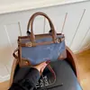 Bolsa de ombro retrô fashion Shuai Mijia para mulheres, nova coleção outono 2026, design simples, alto apelo estético, grande capacidade, bolsa de ombro minimalista
