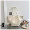Bolso tote de moda para mujer, diseño plisado de alta gama, nuevo bolso de hombro casual más vendido, gran capacidad, bolso de mano versátil, venta al por mayor