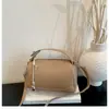 Bolso de mano minimalista de nicho transfronterizo para mujer, nuevo bolso tote pequeño casual para salir, bolso versátil de hombro y bandolera para el día a día