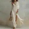 Vestido longo liso para mulheres, novo estilo outono, vestuário feminino transfronteiriço europeu e americano, corte solto, um ombro só e com fenda