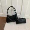Bolsa de mão tecida feminina 2026 nova cor sólida personalidade retrô bolsa de mão moderna versátil para o dia a dia bolsa de axila feminina
