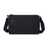 2026 Nova Moda Primavera Cedo Simples Impermeável Nylon Bolsa Feminina Bolsa de Ombro Versátil Leve Bolsa Transversal com Múltiplos Compartimentos