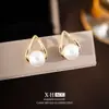Pendientes geométricos de perlas huecas elegantes y con estilo, clips para orejas de espiral a la moda estilo Chanel, pendientes simples y versátiles