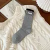 Calcetines de red para mujer, estilo coreano, INS, bloques de color, puño de canalé doble, borde enrollado, calcetines de media pantorrilla, estilo Miu, parche de tela con letras, calcetines holgados de moda