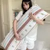 Almohada larga de terciopelo lechoso para mujeres, diseñada para dormir con las piernas recogidas, dormir de lado, respaldo de sofá, cojín de respaldo para sala de estar, nuevo estilo 2026