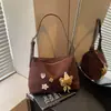 2026 Novo Estilo Versátil Tendência Moda Bolsa Tote Grande Capacidade Moda Transfronteiriça Ombro Único Transversal Feminina Bolsa de Axila