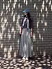 Falda gris para mujer, nuevo modelo otoño 2026, de cintura alta, línea A, con bajo amplio tipo paraguas, talla grande para mujeres con curvas, con un diseño largo fluido y elegante