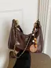 Bolso de Axila para Mujer 2026 Nuevo de Moda Verano Gama Alta Lujo Ligero Nicho para Viajes Diarios Bolso de Hombro Bolso Cruzado Retro