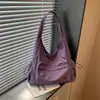 Bolsa de mão simples transfronteiriça de grande capacidade, nova moda outono 2026 bolsa de ombro versátil, bolsa de mão leve para o dia a dia