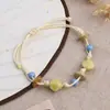 Jingdezhen Navidad Pulsera de Cuerda Trenzada de Cerámica Pulsera de Trébol de Cuatro Hojas Joyería Artística Hecha a Mano Venta al por Mayor Pulseras de Cerámica para Atracciones Turísticas