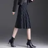 Moda y versátil falda de lana línea A para mujer, otoño 2026 nueva de cintura alta adelgazante elegante que reduce la edad falda de cuadros para mujer