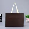 El fabricante suministra bolsas no tejidas hechas a medida, cosidas y laminadas, bolsas de embalaje para regalo al por mayor y bolsas promocionales
