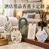 Amuletos de papel perfumado personalizados con logotipos de marca, disponibles en varias formas y aromas, para producción a granel como regalos creativos