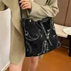 Bolso de axila para mujer de terciopelo retro estilo japonés gamuza otoño e invierno un solo hombro bordado nuevo estilo coreano diagonal de mano moda bandolera 2026