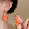 Nuevos pendientes irregulares de resina estilo chino, pendientes de moda retro de nicho de alta gama, lujo ligero, accesorios para orejas de mujer simples y versátiles
